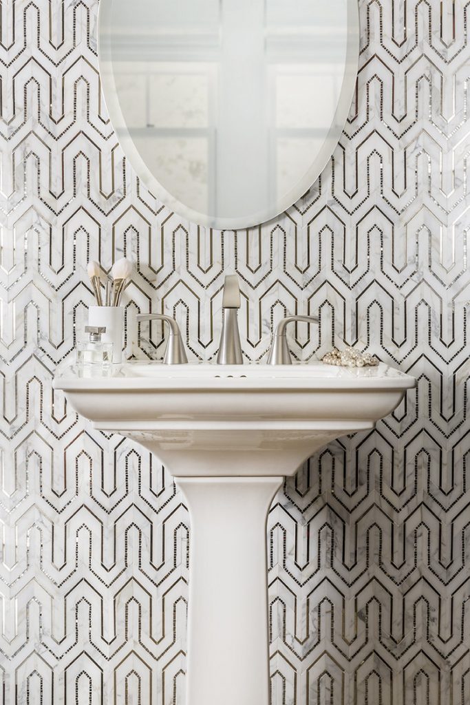 marble sink with patterned wall