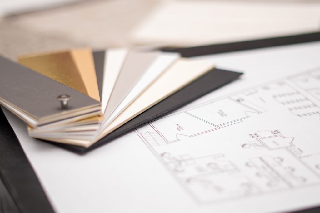 different paint colors and a home blueprint