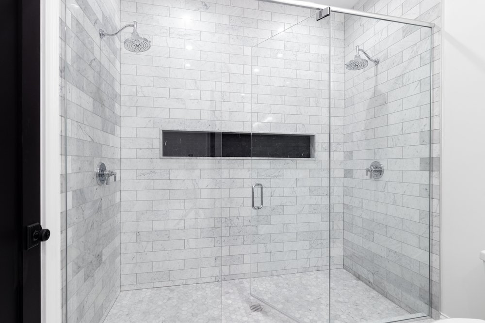grey and white mosaic tiles in a bathroom in south carolina