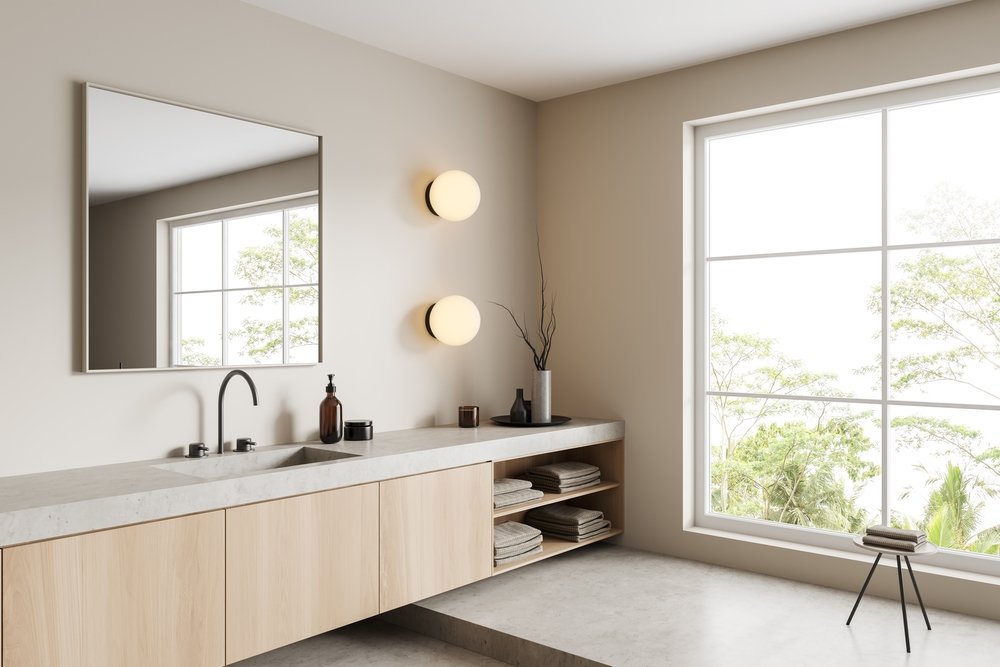 Minimalist bathroom with a large window and mirror.