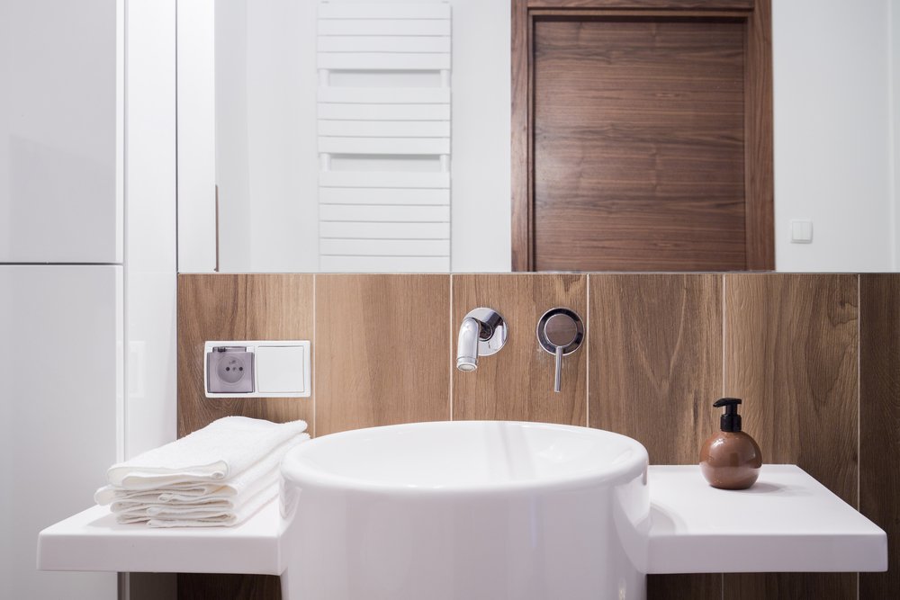 modern guest bathroom with big white sink and countertop