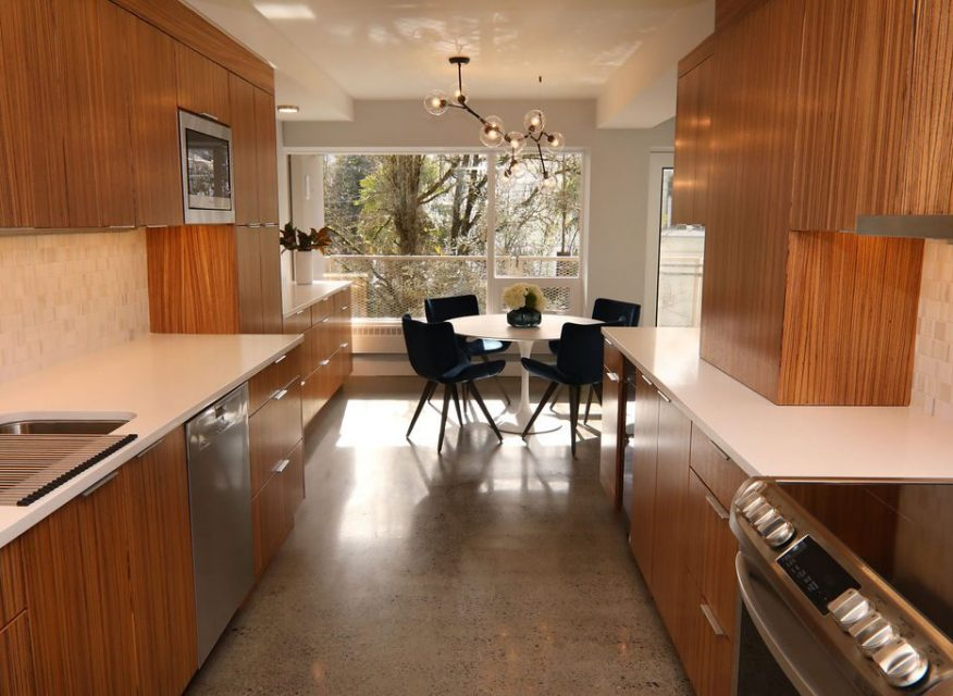 galley kitchen with wooden cabinets